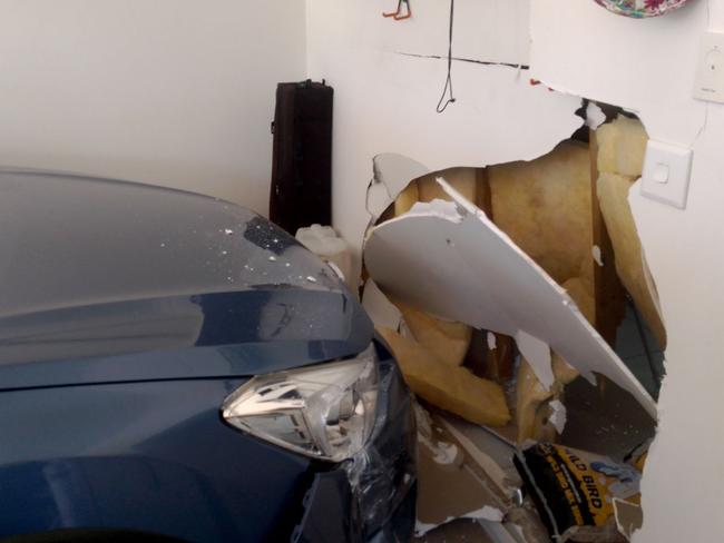 The damage at Jan and Tex Giddings HOME AFTER youths attempted to steal their car, and drove it into their garage wall. Photo: Supplied