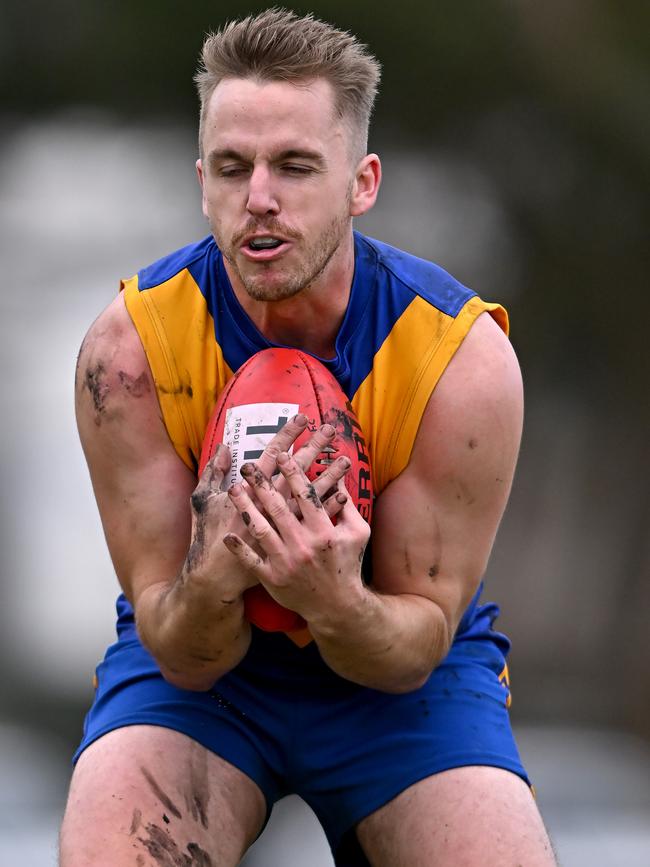 WRFL: Deer Park’s Jake McKenzie takes a mark. Picture: Andy Brownbill