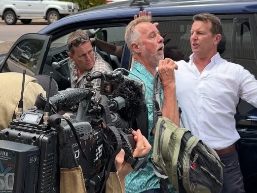 Neil Mellon looks on as the nation’s media records the moment for posterity. Picture: Elise Graham