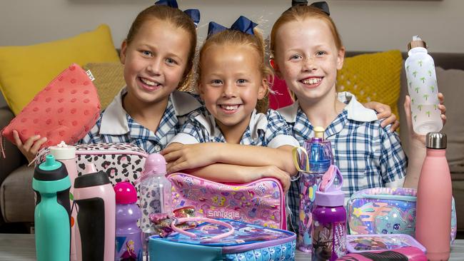 Molly, Daisy and Margot, 7 with their back-to-school supplies. Picture: Tim Carrafa