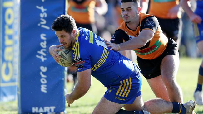 Jakob Giles scores an early try for Toukley. Picture: Sue Graham