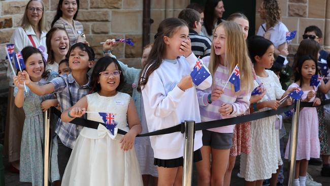 Smiling fans gather outside the church Picture: Rohan Kelly