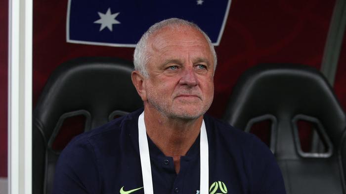 Australia's coach Graham Arnold takes his seat for the FIFA World Cup 2022 inter-confederation play-offs match between Australia and Peru on June 13, 2022, at the Ahmed bin Ali Stadium in the Qatari city of Ar-Rayyan. (Photo by MUSTAFA ABUMUNES / AFP)