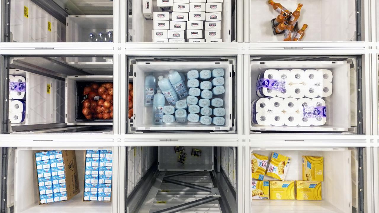 The bots will move around a giant grid of tubs containing grocery items, picking them up and transporting them to human packers. Picture: Martin Keep/Coles