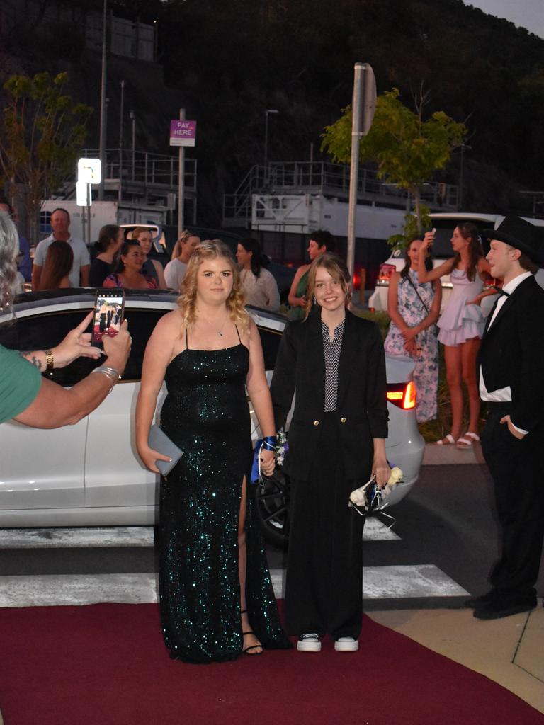 Hayley Edge and Holly Smith at the Proserpine State High School formal at Shute Harbour Marine Terminal on November 15, 2023. Photo: Zoe Devenport