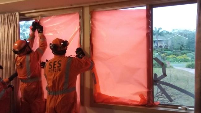 SES officers carry out repairs on a home in Manningham.