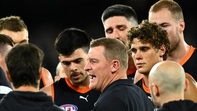 MELBOURNE, AUSTRALIA – MAY 05: Blues head coach Michael Voss speaks to his player during the round eight AFL match between Carlton Blues and Brisbane Lions at Marvel Stadium, on May 05, 2023, in Melbourne, Australia. (Photo by Quinn Rooney/Getty Images)