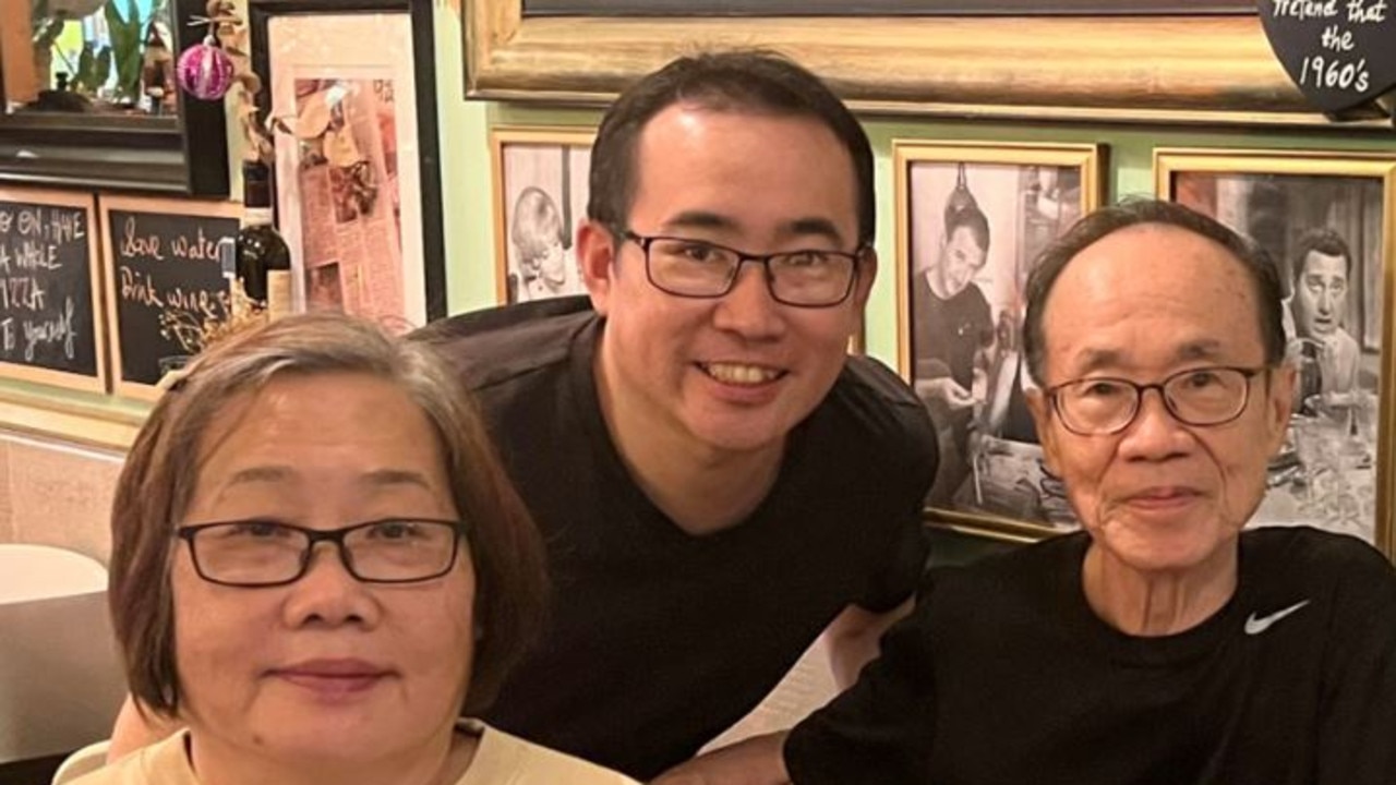 Gerald Chin, 41, was scammed out of $49,000 after falling for a text message scam. He had saved up the money to take his parents (pictured) overseas for Christmas. Picture: 7 News