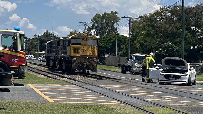 A train and car collide at the intersection of Cambridge and Denison Streets, Rockhampton, about 1pm.