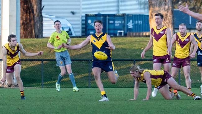 Bryce Alomes kicks one of his six goals in the SFLÃ¢â‚¬â„¢s win over the North-West. Picture Joeb Dedman