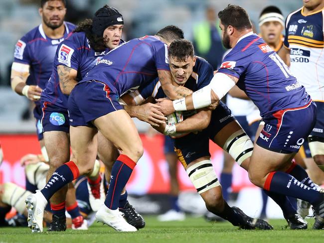 CANBERRA, AUSTRALIA - MAY 12: Rory Arnold of the Brumbies is tackled during the round 12 Super Rugby match between the Brumbies and the Rebels at GIO Stadium on May 12, 2018 in Canberra, Australia.  (Photo by Mark Nolan/Getty Images)