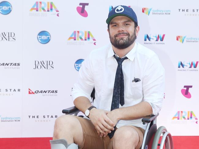 Unusual red carpet look ... Seth Sentry, in a wheelchair with a broken foot. Picture: Dylan Robinson