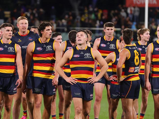 ADELAIDE, AUSTRALIA - JUNE 06: Crows players after the loss during the 2024 AFL Round 13 match between the Adelaide Crows and the Richmond Tigers at Adelaide Oval on June 06, 2024 in Adelaide, Australia. (Photo by Sarah Reed/AFL Photos via Getty Images)