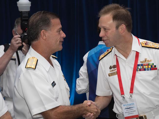 Chief of Navy, Vice Admiral Mike Noonan AO, RAN (right) greets United States Navy Admiral John C. Aquilino, the Commander of the US Pacific Fleet, at the start of Seapower 19 at the International Convention Centre in Darling Harbour, Sydney. Photo - Royal Australian Navy