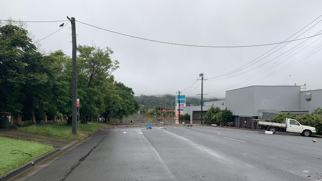 Receding flood water reveals damage in Diadem Street, Lismore, on March 1, 2022.