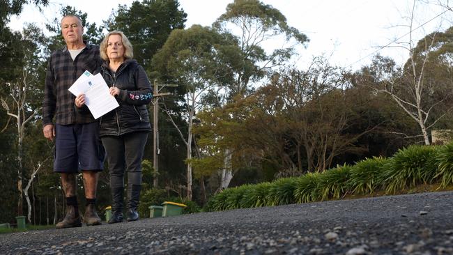 Russell and Jan Black are fighting Yarra Ranges Council after being told they would have to pay more to seal their road, because they have the potential to subdivide their block. Picture: Stuart Milligan