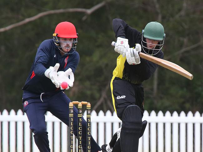 Kookaburra Cup match between Surfers Paradise and Southport, Southport/Labrador batsman Ruben Berger and Surfers wicketkeeper Claye Beams. Picture: Mike Batterham