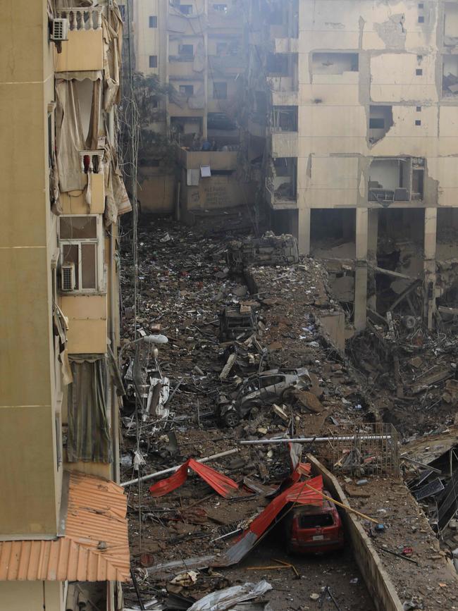 A picture shows a view of the destruction at the site of an overnight Israeli airstrike on the Laylaki neighbourhood in Beirut's southern suburbs on Tuesday. Picture: AFP