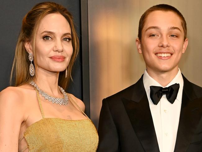 HOLLYWOOD, CALIFORNIA - NOVEMBER 17: (L-R) Angelina Jolie and Knox Jolie-Pitt attend the 2024 Governors Awards at Dolby Theatre on November 17, 2024 in Hollywood, California.  (Photo by Jon Kopaloff/Getty Images)