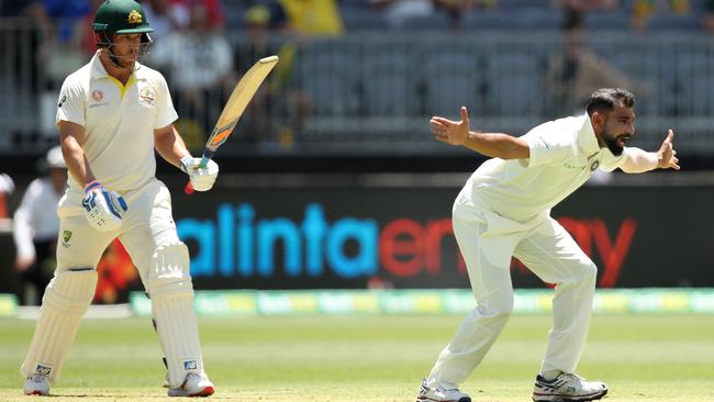 A member of India’s four-pronged pace attack, Mohammed Shami, unsuccessfully appeals for lbw against Aaron Finch. Picture: Getty Images