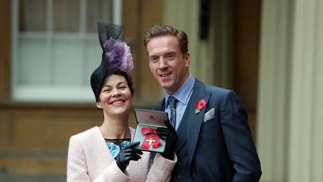 McCrory with her husband Damian Lewis, after she was awarded an Officer of the Most Excellent Order of the British Empire (OBE) for services to drama.