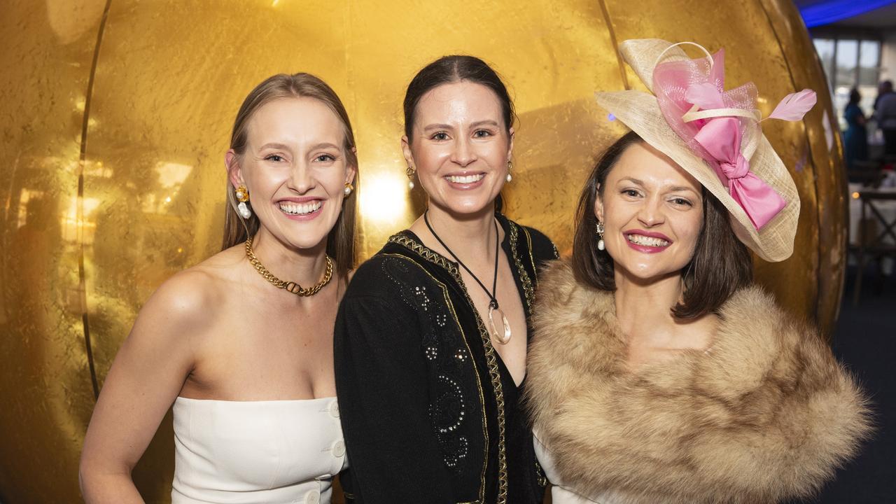 At the Emergency Services race day are (from left) Abbey Godwin-Smith, Elizabeth Grimmond and Renee Loxley at Clifford Park, Saturday, August 10, 2024. Picture: Kevin Farmer