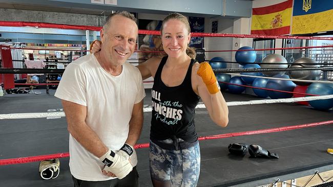 Singer-songwriter Mark Seymour (left) with boxing trainer Tiffanee Cook (right) at St Kilda PCYC in March 2024. Picture: Andrew McMillen