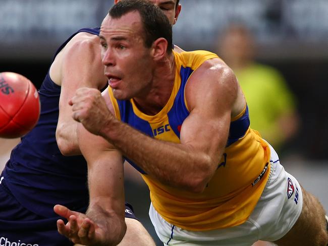 PERTH, AUSTRALIA - APRIL 29: Shannon Hurn of the Eagles handballs during the Round 6 AFL match between the Fremantle Dockers and West Coast Eagles at Optus Stadium on April 29, 2018 in Perth, Australia.  (Photo by Paul Kane/Getty Images)