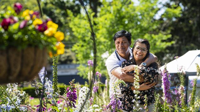 Brisbane visitors Prabhat (left) and Prathna Baagdas in Queens Park for the last day of the Carnival of Flowers, Monday, October 7, 2024. Picture: Kevin Farmer