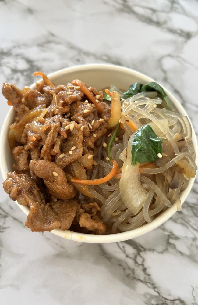 Cupbap is served in a cup, combining either pork, beef or chicken with fried rice and noodles. Picture: Supplied.