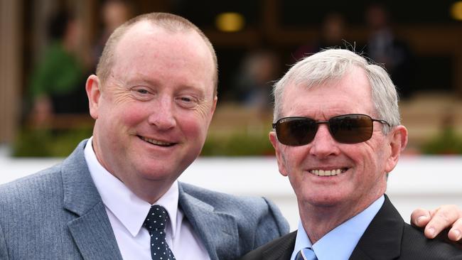 Trainers Wayne Hawkes and John Hawkes pose after Wild Planet won race 5, the Furphy Ale March Stakes, during Super Saturday at Flemington Racecourse in Melbourne, Saturday, March 7, 2020. (AAP Image/Vince Caligiuri) NO ARCHIVING, EDITORIAL USE ONLY