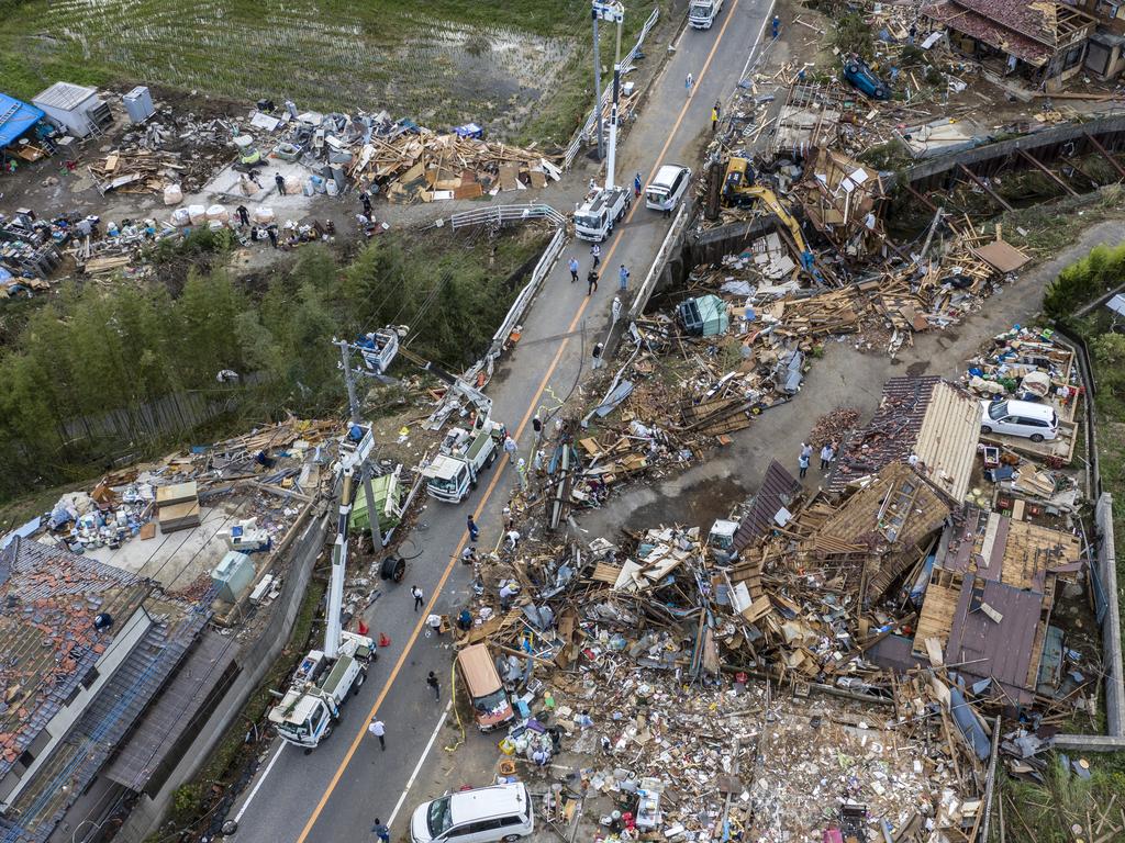 Buildings lie in ruins after they were hit by a tornado shortly before the arrival of Typhoon Hagibis. Picture: Court/Getty Images