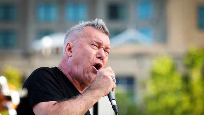 Jimmy Barnes performs in Melbourne's CBD during a busking gig. Picture: Mark Stewart.