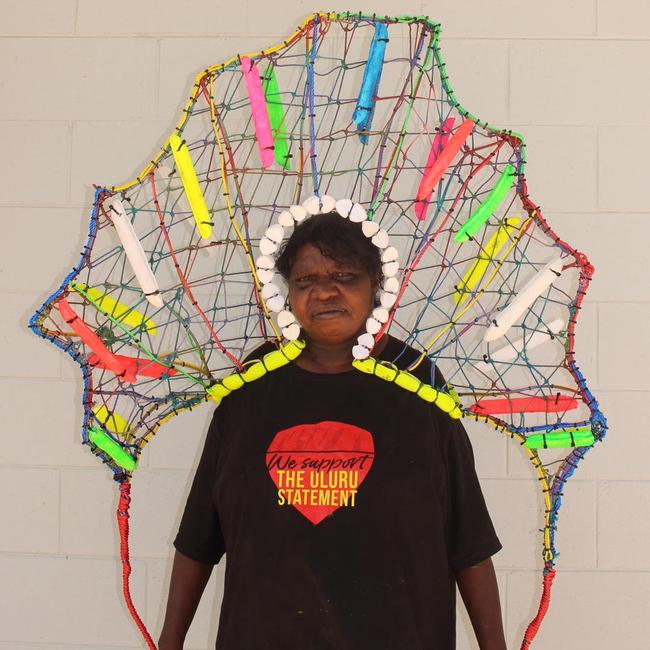 Mylene Holroyd of Pormpuraaw Art &amp; Culture Centre displays her Rose Hat.