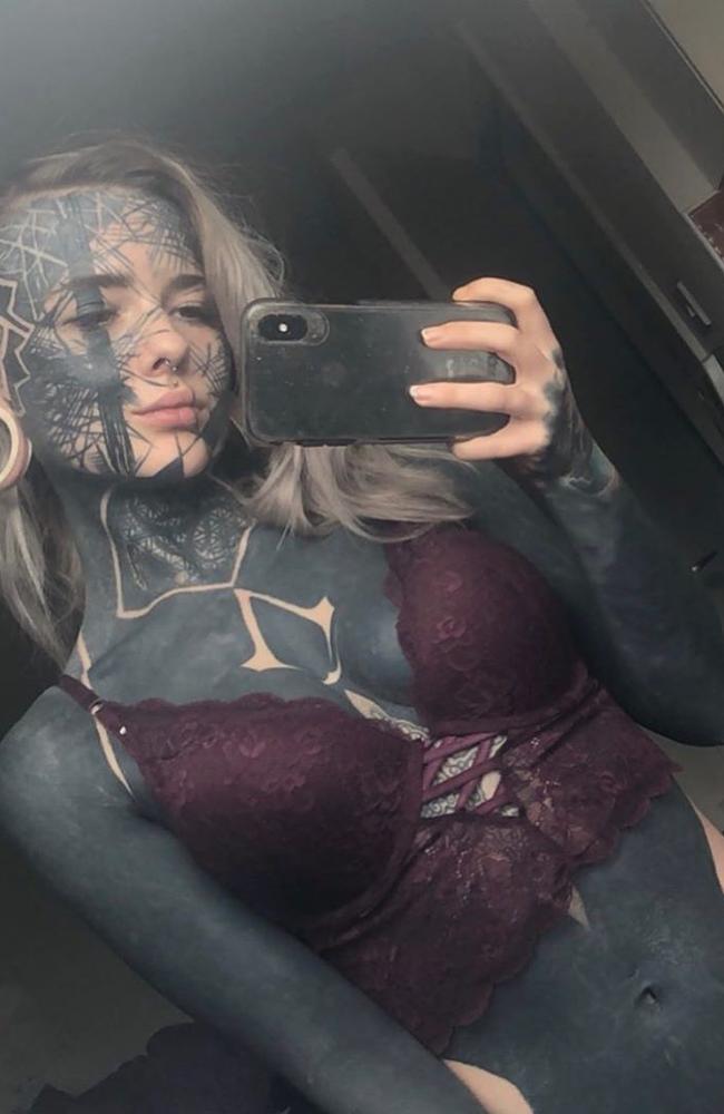 Woman covers 90% of body in tattoos to be 'daddy's girl