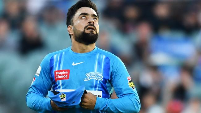 ADELAIDE, AUSTRALIA - JANUARY 05: Rashid Khan of the Strikers after bowling his last ball during the Men's Big Bash League match between the Adelaide Strikers and the Hobart Hurricanes at Adelaide Oval, on January 05, 2023, in Adelaide, Australia. (Photo by Mark Brake/Getty Images)