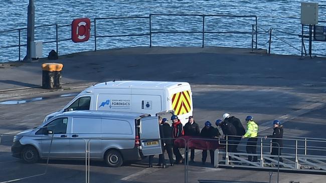 A body recovered from the wreckage of a plane that crashed in the English Channel is unloaded at Weymouth harbour on Thursday. It has been identified as that of Argentine footballer Emiliano Sala. Picture: Glyn Kirk/AFP