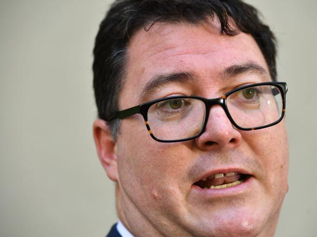 George Christensen has been slammed for posting a mock image of himself aiming a gun at Greens supporters. Picture: AAP