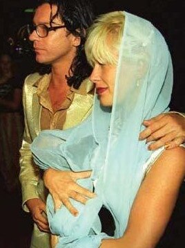 Michael Hutchence with Paula Yates and Tiger-Lily.