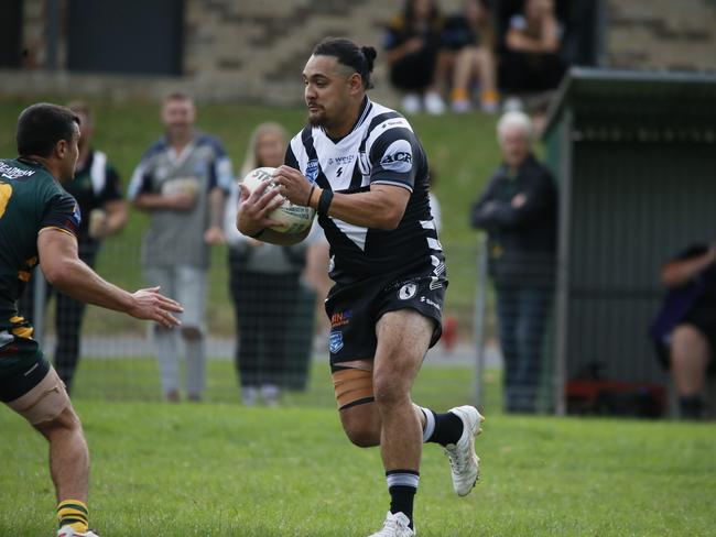 Henry Lealuga-Puhotau takes Picton forward. Picture: Warren Gannon Photography