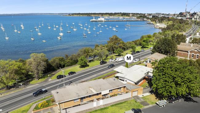 The house offers views through parkland to Corio Bay boating.