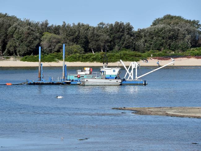 The dredge at work at The Entrance channel. Picture: Troy Snook