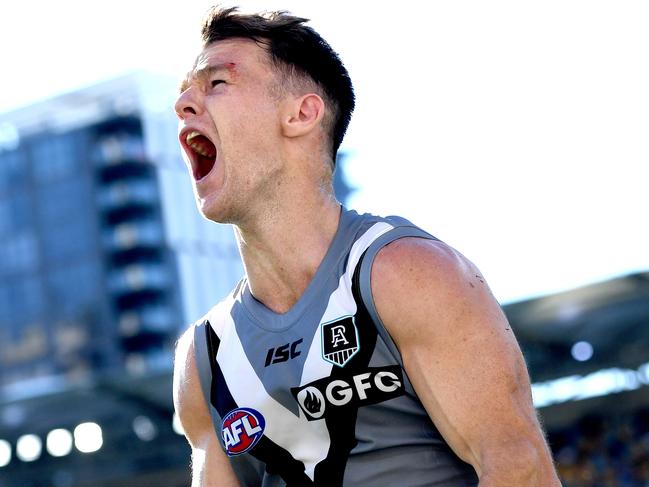 BRISBANE, AUSTRALIA - JULY 19: Robbie Gray of Port Adelaide celebrates kicking the match winning goal during the round 7 AFL match between the Carlton Blues and the Port Adelaide Power at The Gabba on July 19, 2020 in Brisbane, Australia. (Photo by Bradley Kanaris/Getty Images) *** BESTPIX ***