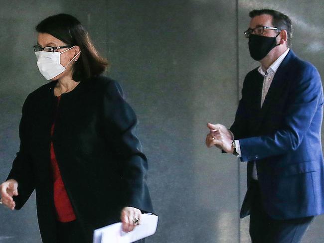 MELBOURNE, AUSTRALIA - NewsWire Photos AUGUST 10, 2020 : Victorian Health Minister Jenny Mikakos and Victorian Premier Daniel Andrews leave the press conference after announcement of recent COVID-19 infection numbers across the state.  Picture : NCA NewsWire / Ian Currie