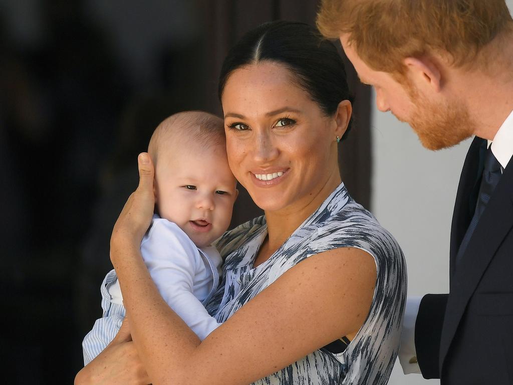 Meghan, with son Archie and husband Harry, has withdrawn from royal life. Picture: Toby Melville/Getty Images