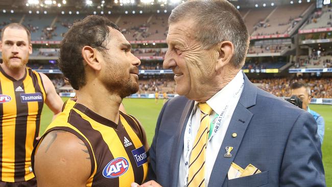 President Jeff Kennett congratulates Cyril Rioli after a MCG victory. Picture: Michael Klein