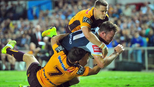 NRL NQ Cowboys versus Brisbane Bronco's at 1300 Smiles Stadium in Townsville, QLD. Cowboy's Gavin Cooper and Bronco's Ben Hunt and Dale Copley . Picture: Wesley Monts