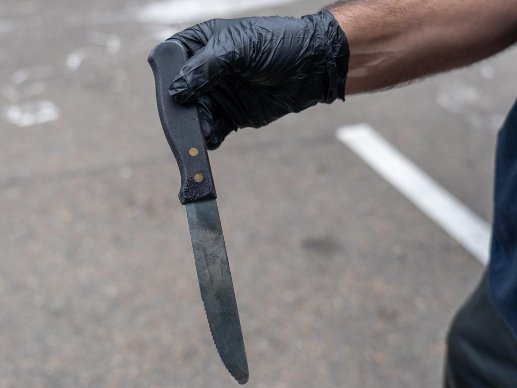 A knife uncovered during the seizures. Picture: AFP