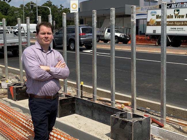 Labor candidate for The Gap ward, Daniel Bevis, at Waterworks Rd where the bus indent has been removed.