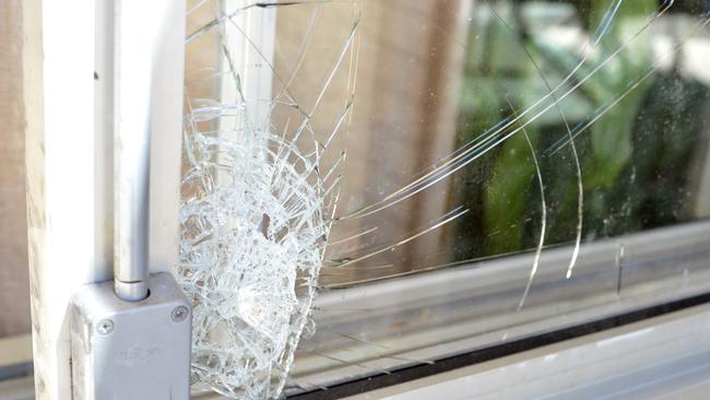 SHATTERED: The Warwick man shattered a window and broke a front door during the violent argument. Photo: Warren Lynam